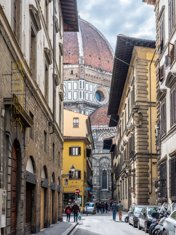 Looking at The Duomo down an alley in Florence.